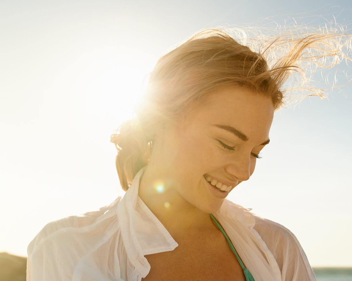 Woman outside smiling