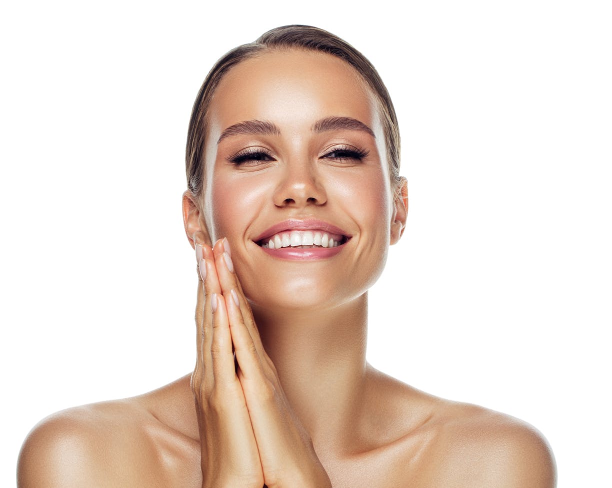 Woman holding her hands up to her face smiling