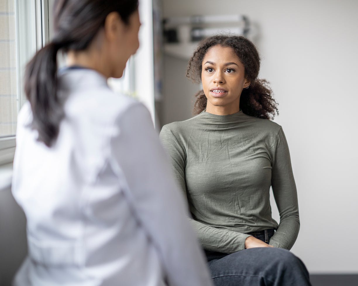 Doctor talking to a woman