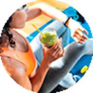 Female with healthy smootie looking at watch
