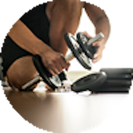 Facility Manager with dumbbell