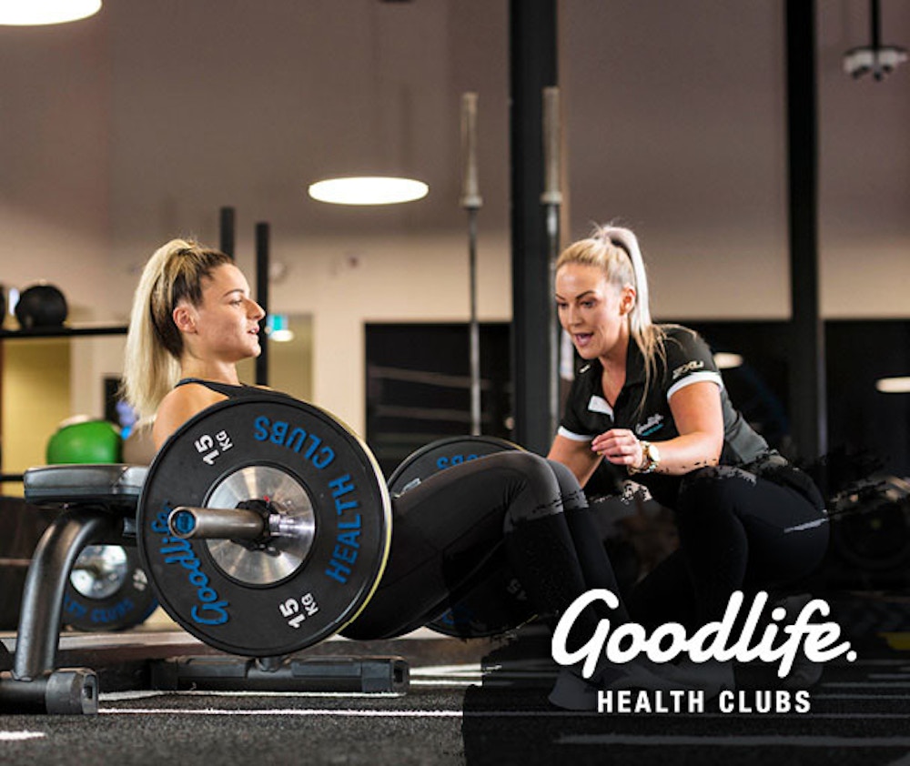 two females working out with weights