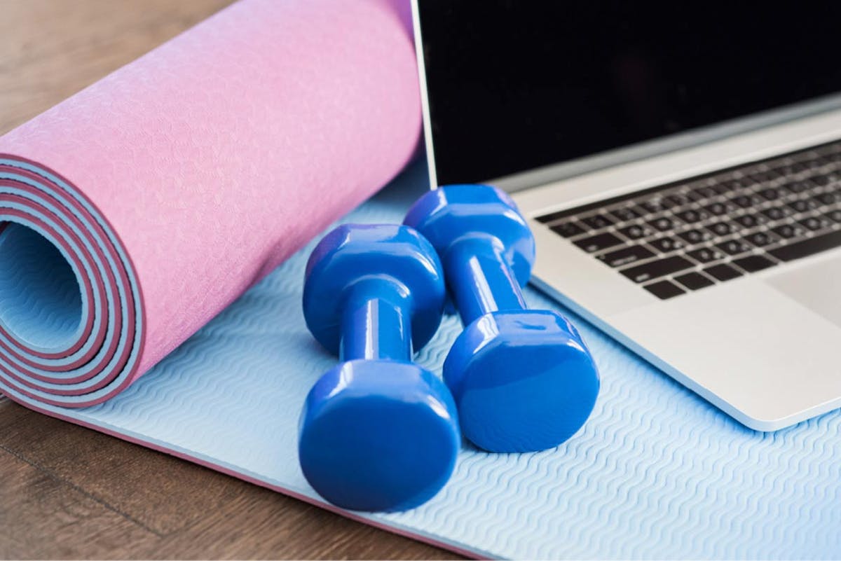 workout gear and laptop