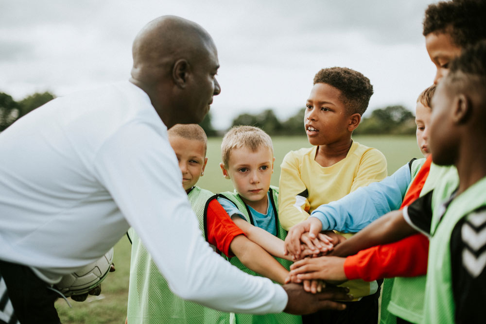 Football Coach and Team - AIPT