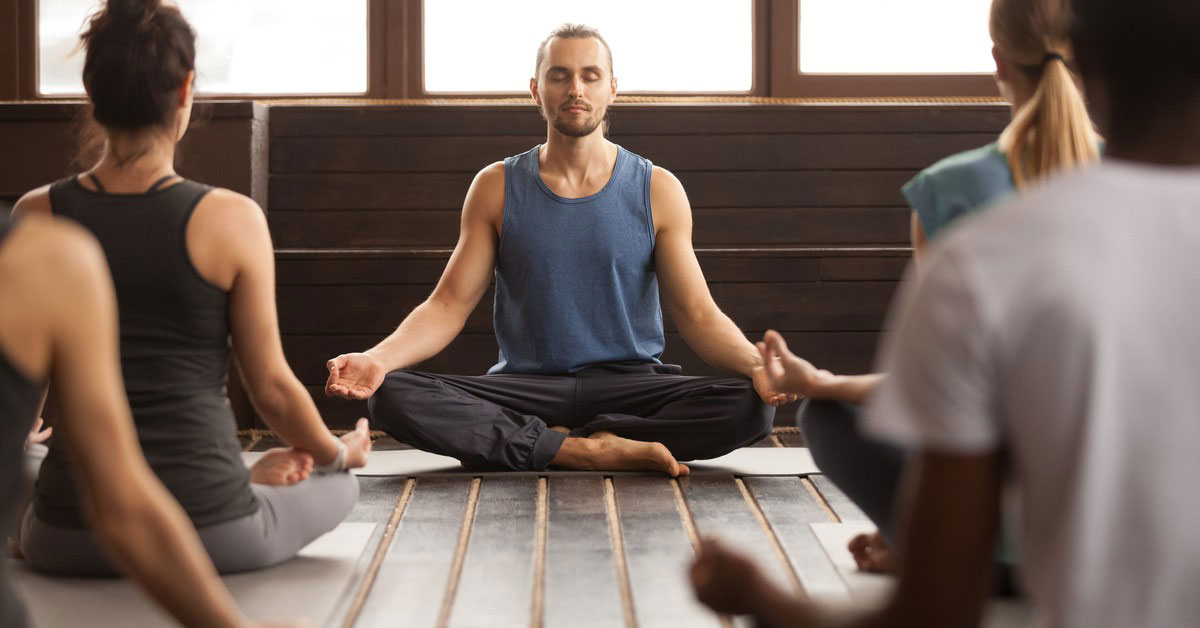 Yoga Instructor with students