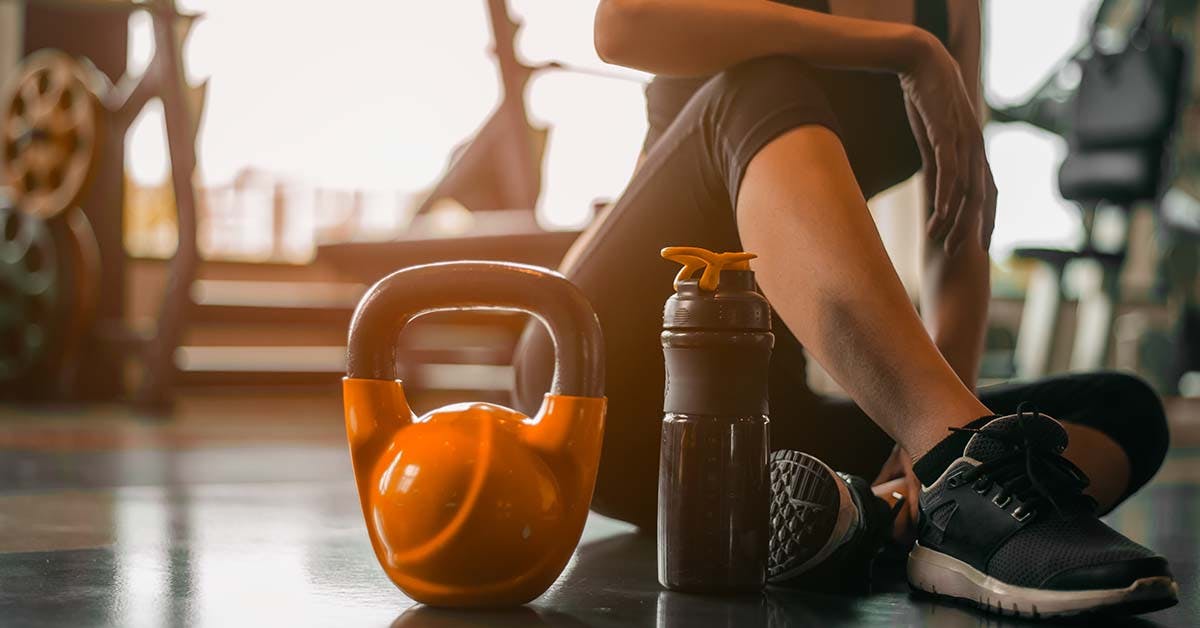 Fitness woman relaxing after exercise