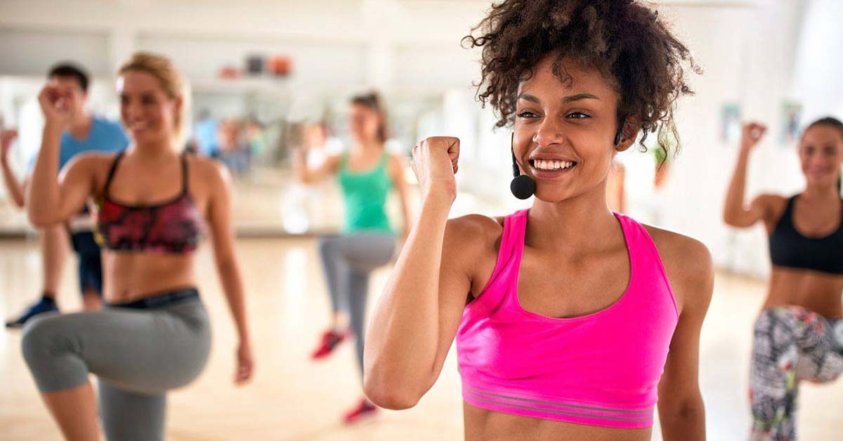 Group exercise instructor teaching a group class