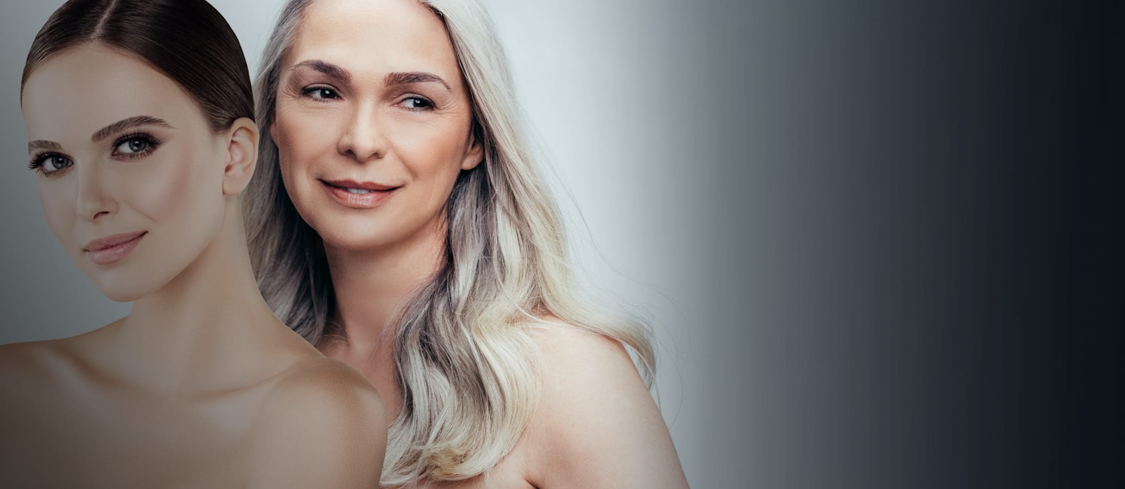 One younger and one older woman, both smirking