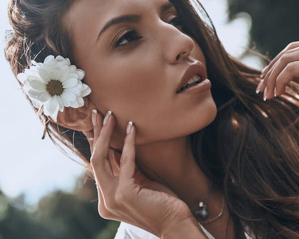 woman with flower in hair
