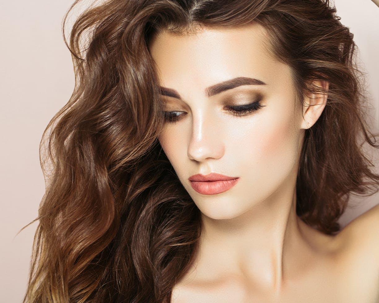 brunette woman with makeup on