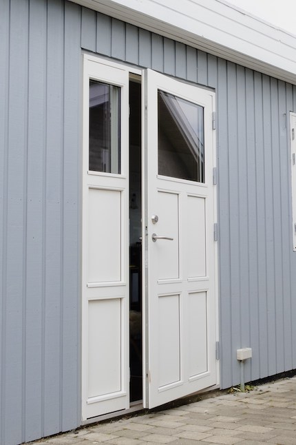 White front door with sidelights