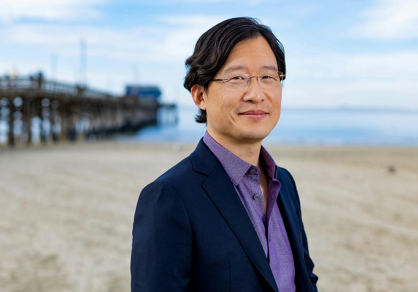 an image of Dr. Lee by the beach