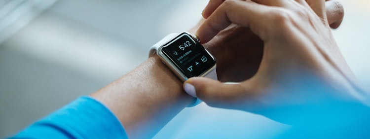 person clicking Apple Watch smartwatch
