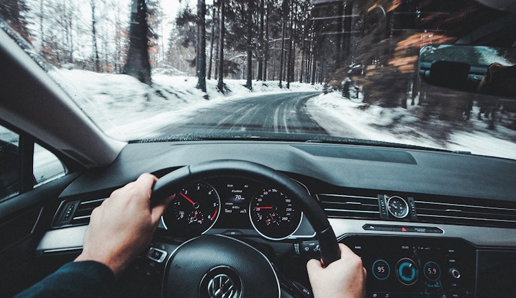 person driving Volkswagen vehicle