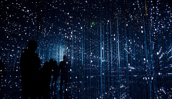 a group of people standing next to each other