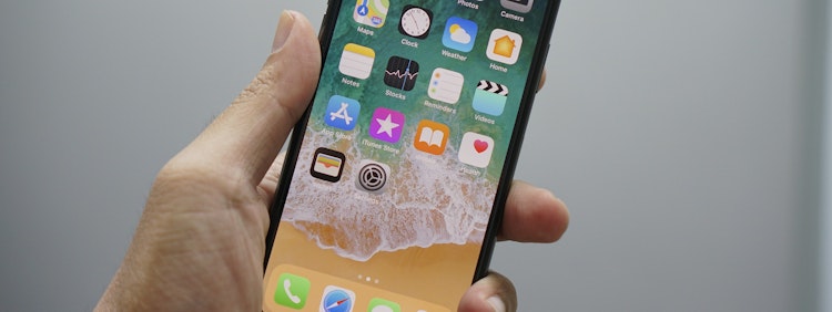 person holding space gray iPhone 7