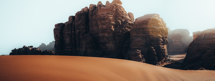 a desert landscape with rocks and sand