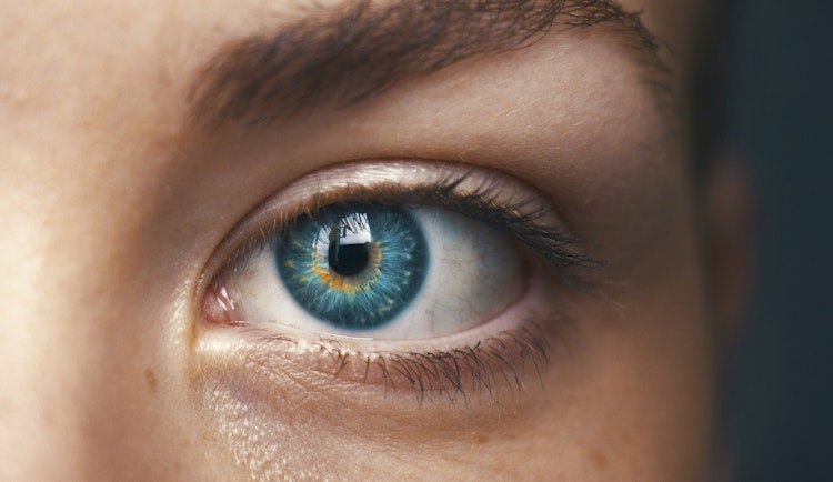 selective focus of blue-eyed person