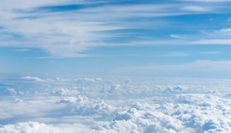 above-cloud photo of blue skies