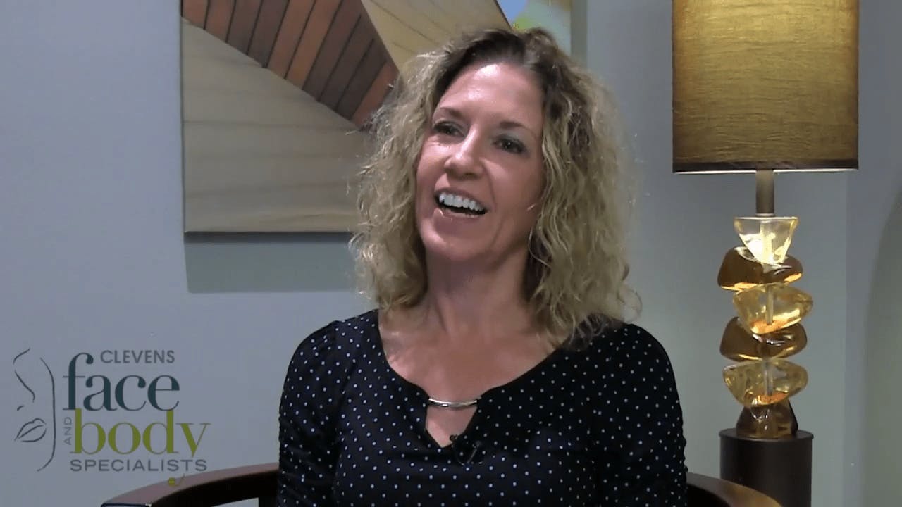 Woman giving testimonial on facial plastic surgery procedures