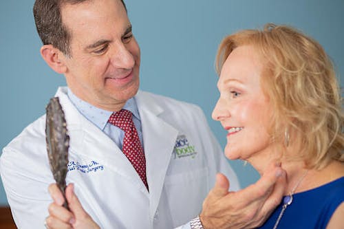 Dr. Clevens with a Patient