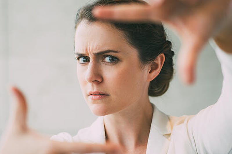 Woman Making a Camera Angle with Her Hands
