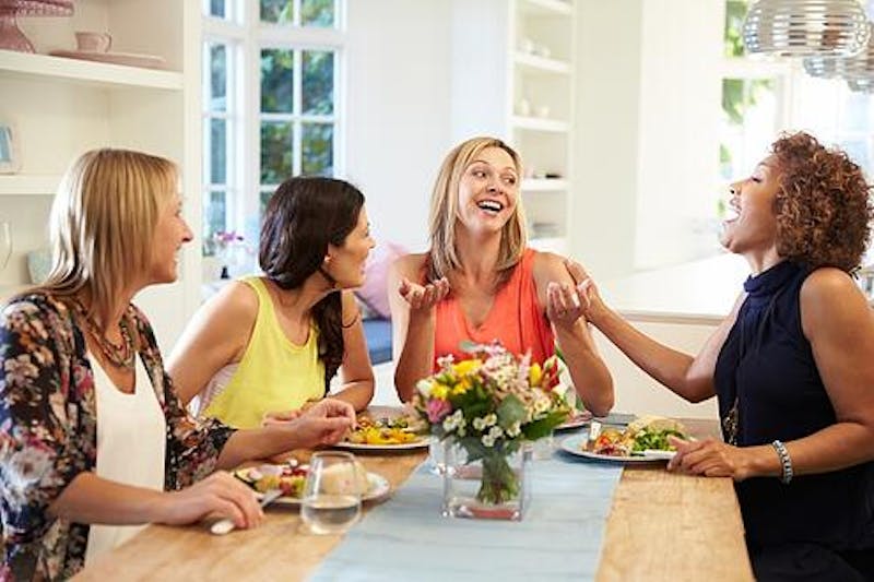 Women Chatting Over Dinner