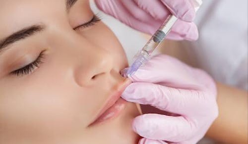 Woman Receiving an Injection