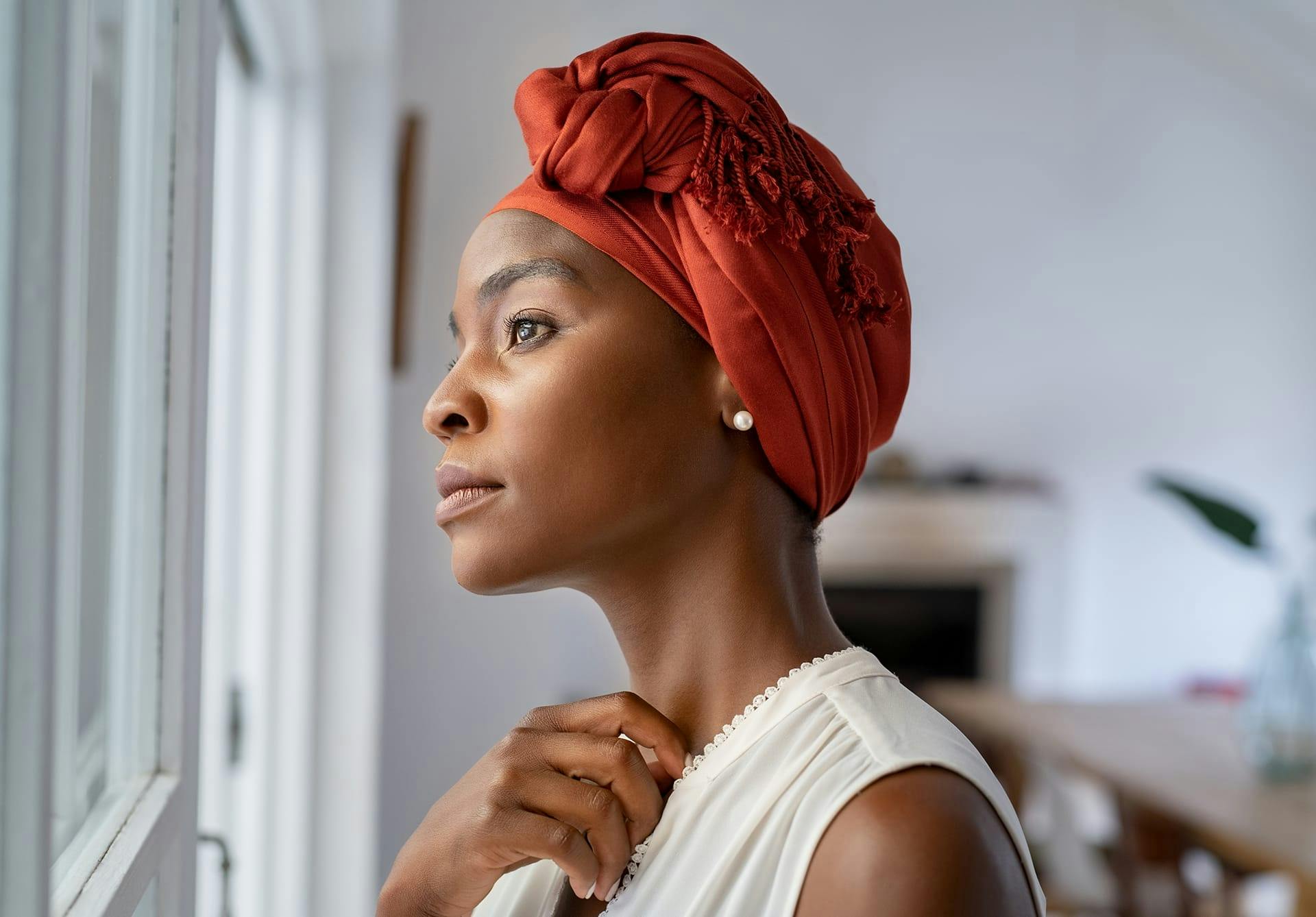 woman looking out the window