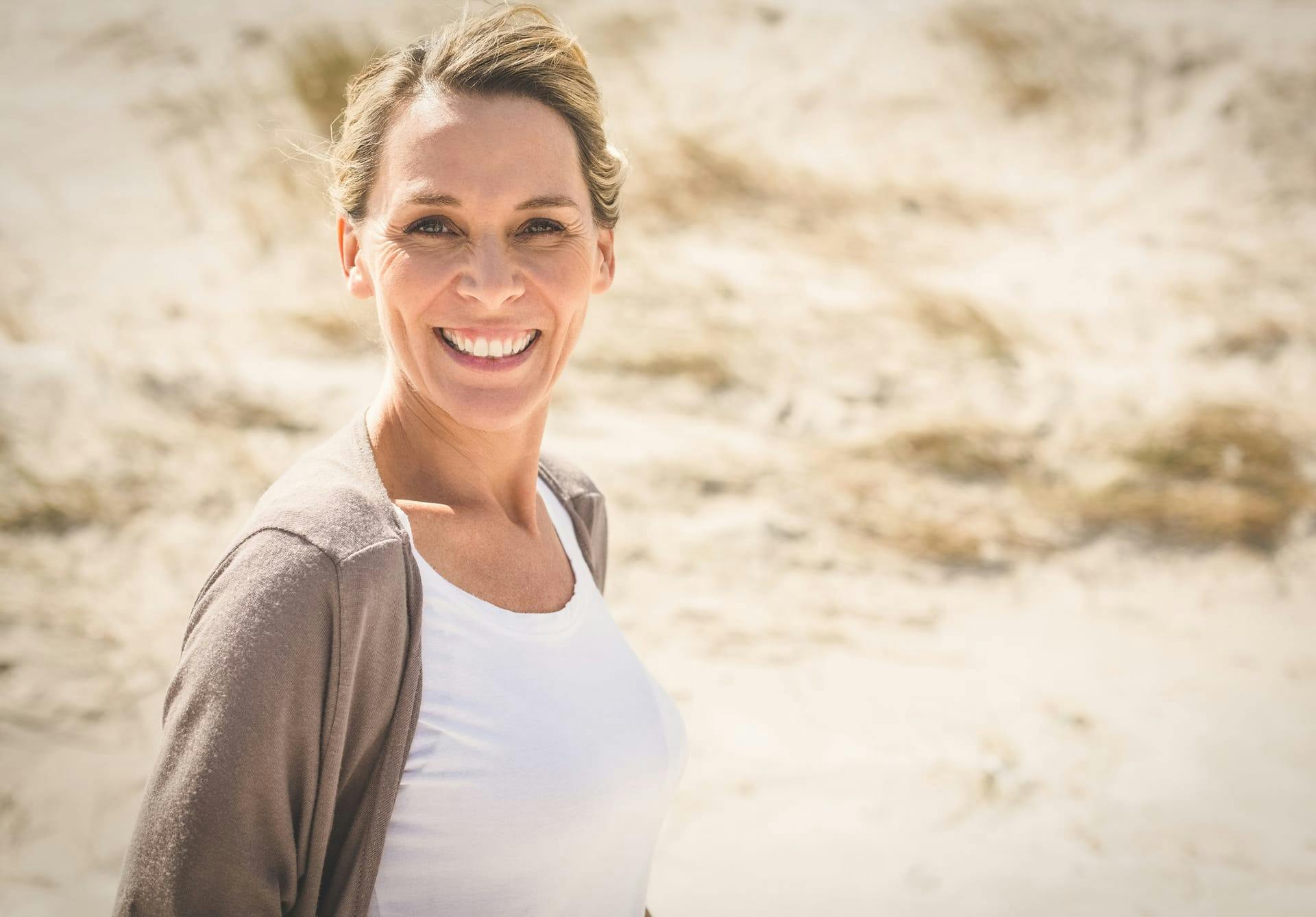 woman smiling on beach