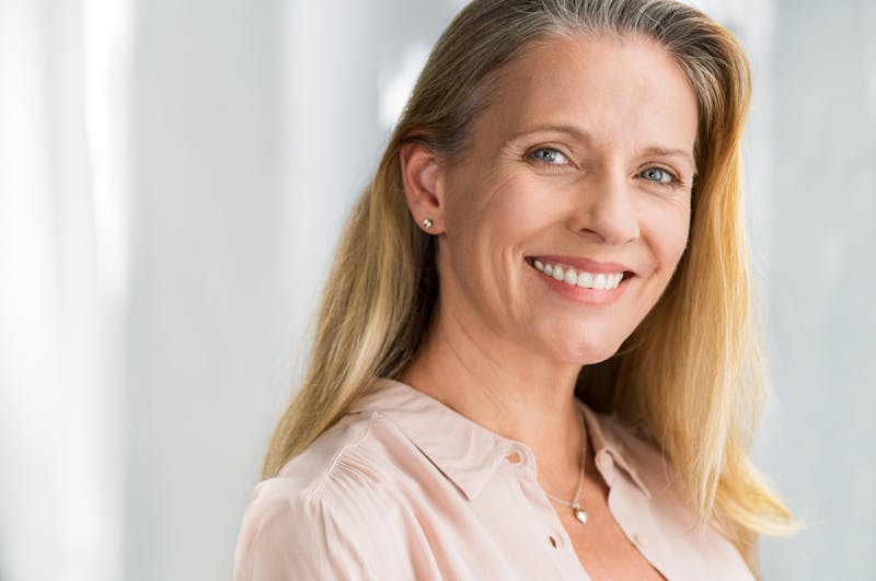Blonde woman smiling