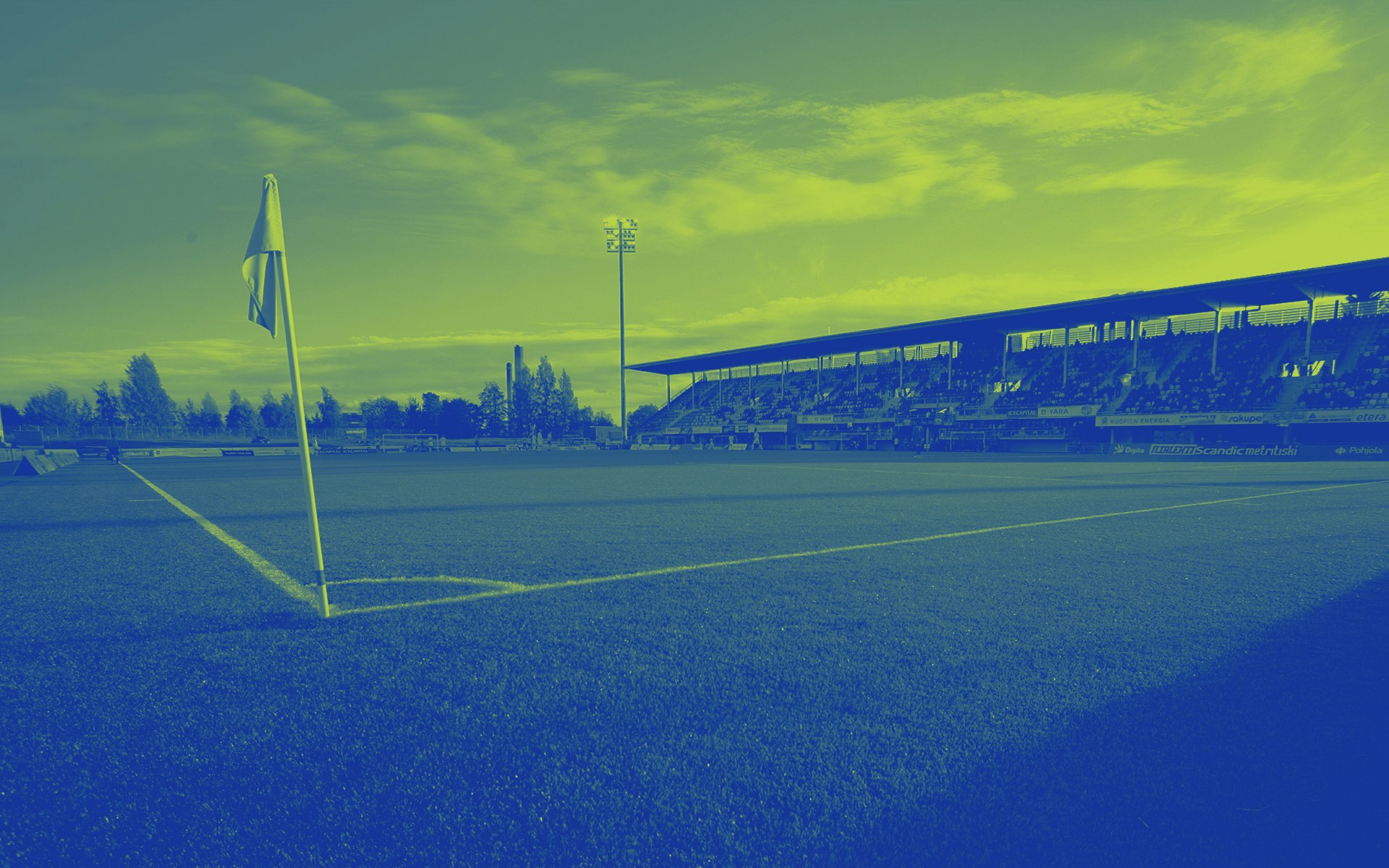 Jalkapallo-olosuhteet ja ympäristö -sivun hero-kuva, jossa jalkapallostadion kulmalipulta kuvattuna