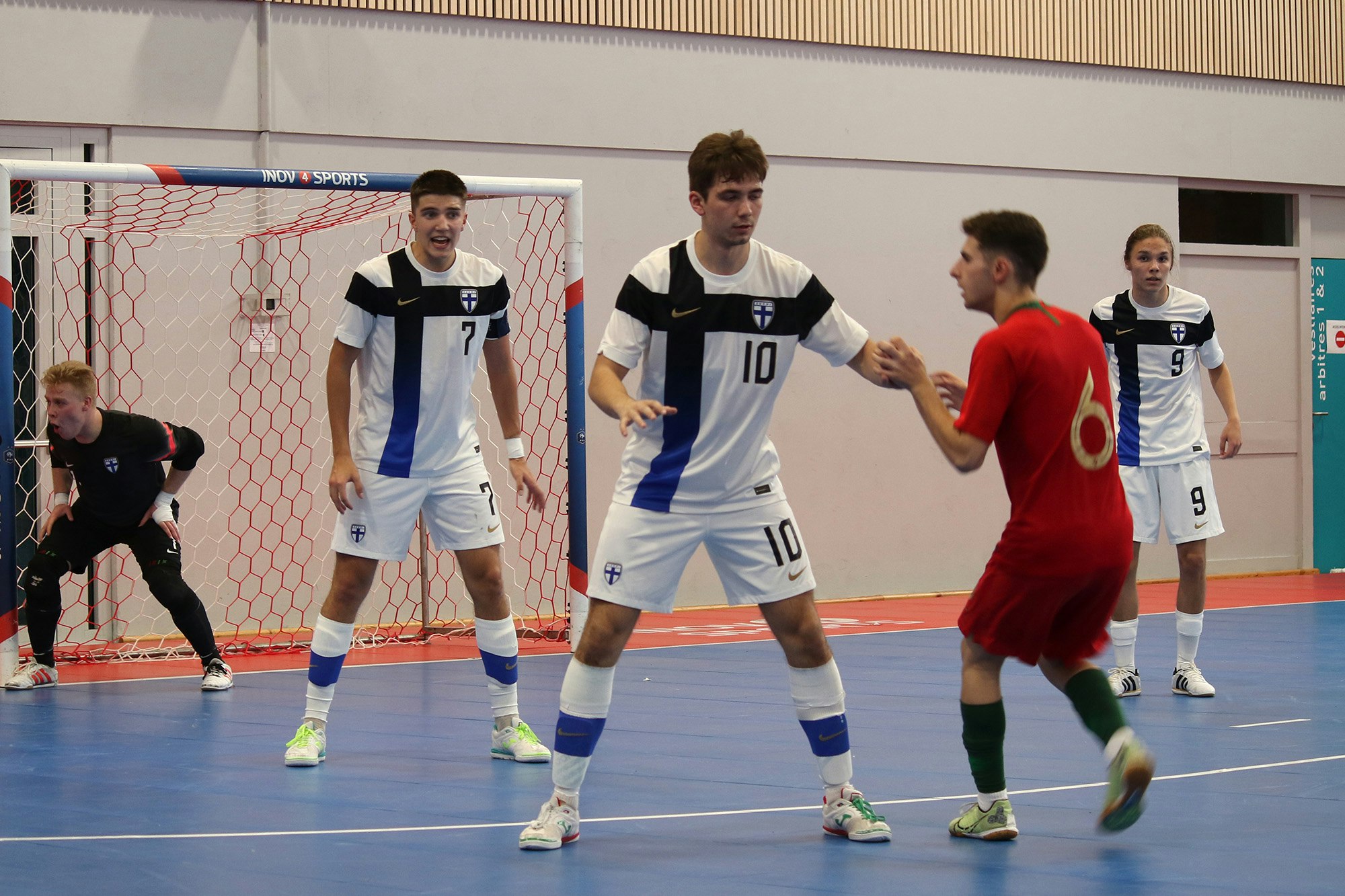 Portugali-pelissä maalivahti Otso Honkonen, kapteeni Mikko Mämmilä, Otto Mäntylä ja Otto Niemelä