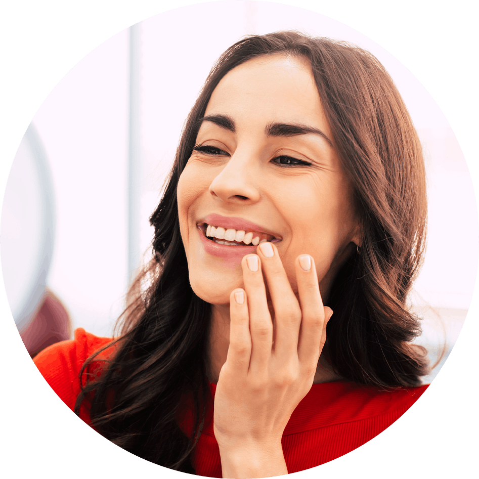 Patient smiling after getting dental crowns in Burbank