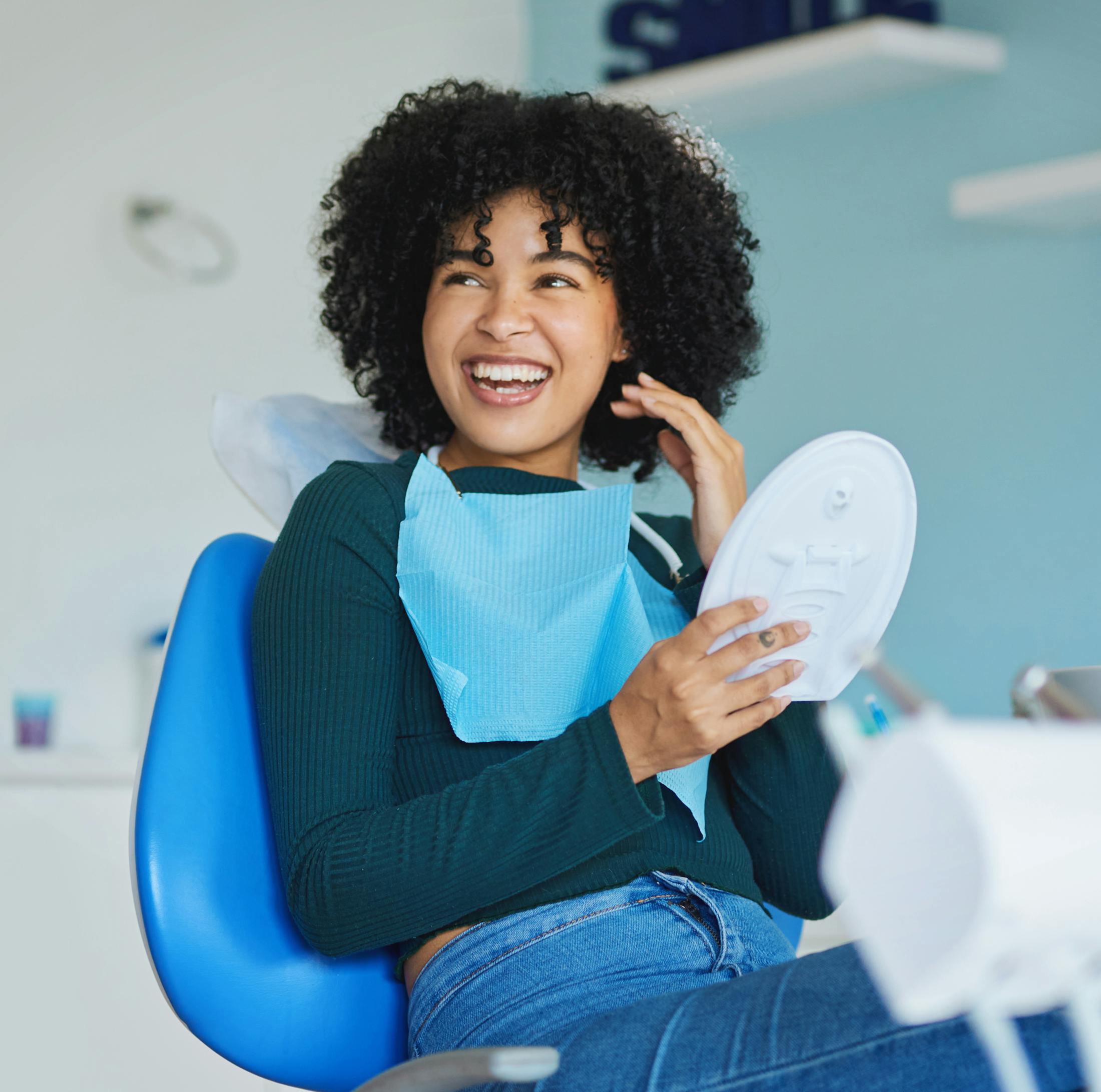 patient smiling after her full mouth rehabilitation burbank