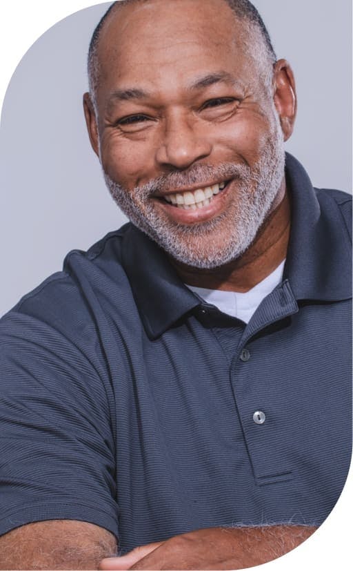 smiling man after implant dentistry burbank
