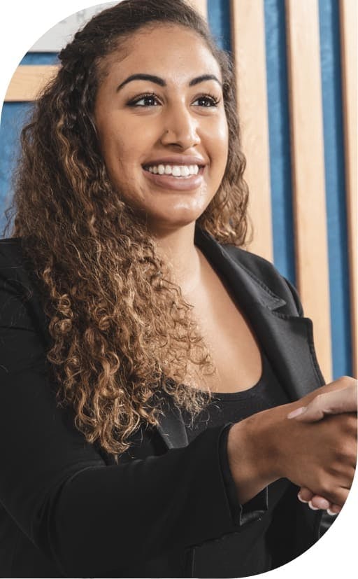 smiling woman after seeing implant dentist burbank