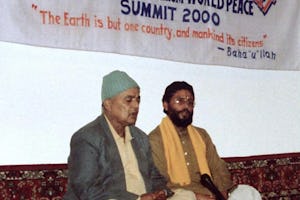 Participants offer prayers during an interfaith meeting organized by the State Baha’i Council of Sikkim, India, on 28 August 2000 to mark the opening of the United Nations Millennium World Peace Summit of Religious and Spiritual Leaders.