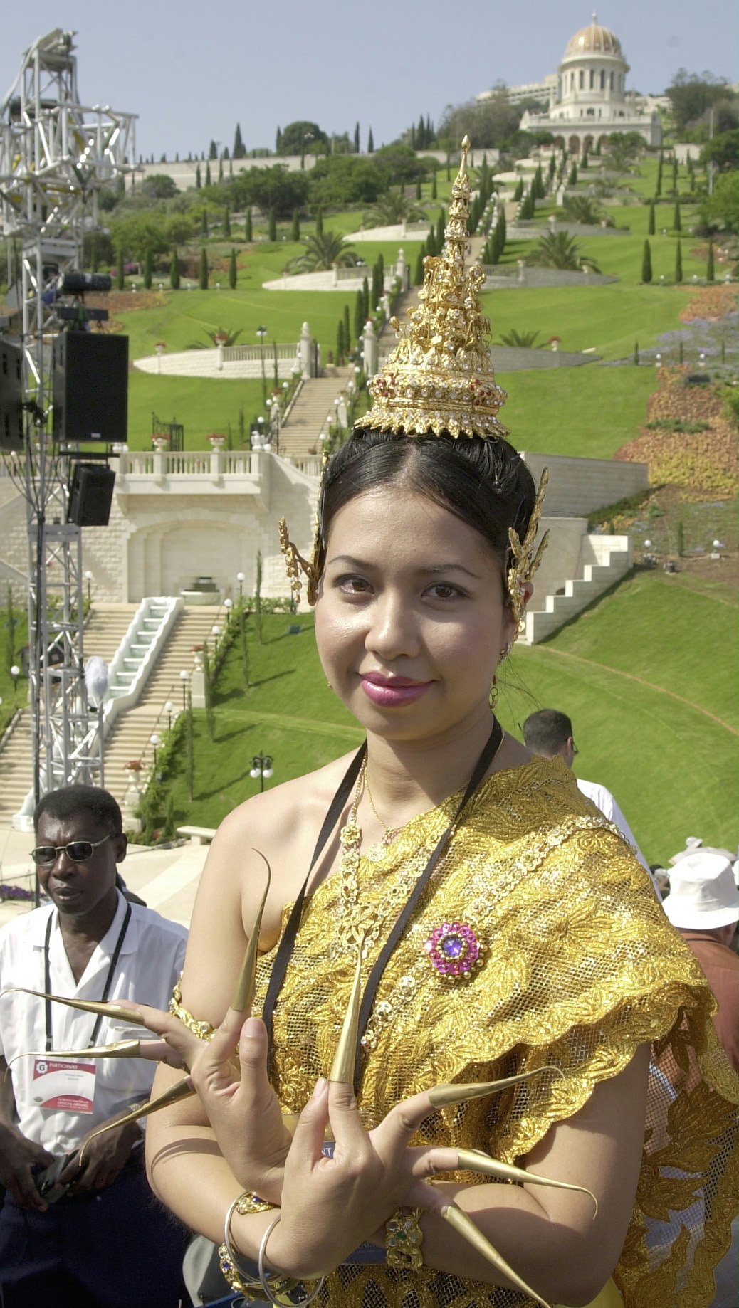 A representative of the Baha'i community of Thailand in her national dress at a devotional program on 23 May 2001 at the entrance plaza of the Terraces on Mount Carmel.