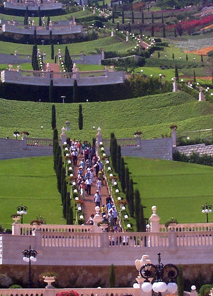 More than 20 tour groups, each with 40 to 50 tourists, are guided through the Baha'i Terraces on Mount Carmel each day.