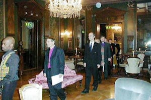 A procession of representatives of 25 religions in Norway enter a hall at the Norwegian Academy of Science and Letters for the signing of the Oslo Declaration on Freedom of Religion or Belief on 8 November 2001.