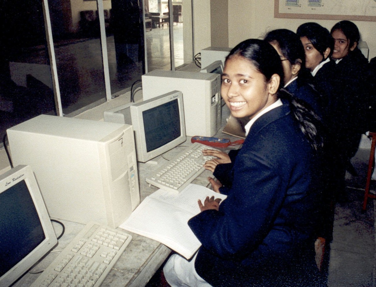 With a current enrollment of more than 25,000 students, City Montessori School was listed by the 2000 Guinness Book of World Records as the world's largest school.| The school is also among the most modern in Lucknow. Shown here is a computer class at the Gomti Nagar branch of the school.