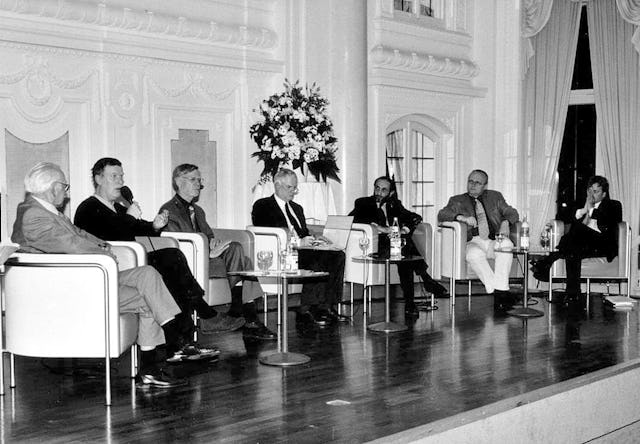 More than 400 people gathered in Stuttgart, Germany, for a World Religion Day commemoration sponsored by the Baha'i Community of Germany on 20 January 2002 to hear a panel discussion on “Religions against Violence.”| Shown, left to right, are the panelists: Meinhard Tenné, Central Jewish Council of Germany; Dr. Paul Köppler, German Buddhist Union; Prof. Urs Baumann, University of Tübingen, Department of Theology; Dr. Andreas Rössler, Chief Editor, Evangelisches Gemeindeblatt für Württemberg; Dr. Nadeem Elyas, President, Central Muslim Council of Germany; Christopher Sprung, National Spiritual Assembly of the Baha'is of Germany; and Dr. Johannes Frühbauer of Hans Küng's Foundation for World Ethics.