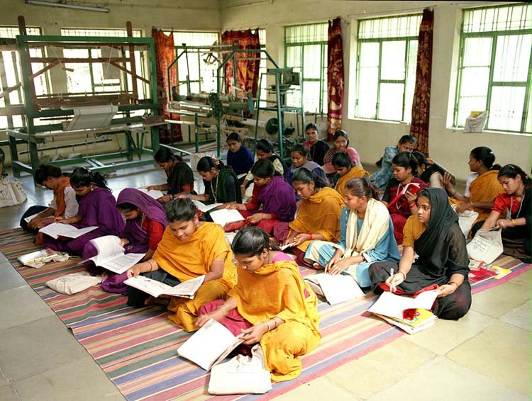 The Barli Development Institute for Rural Women in Indore, India, and its forerunner have trained more than 1,300 young women and girls since 1985.| Empowered by their training as agents for social change, graduates have had a measurable impact on the well-being of their families and home villages. Shown here is a class of trainees at the Institute.