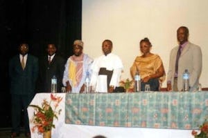 For United Nations Day on 24 October, the local Baha'i communityof Buea, Cameroon, organized an interfaith discussion on world peace.| Shown left to right are: Jules-Marcel Mondeng, permanent Secretary General of the South West Province; John Akuri, moderator of the panel; Auztaz Mohammed Aboubakar, the Muslim Imam of Buea; the Reverend Father Alosius Ituka Ndifor, secretary to the Bishop of the Catholic Diocese of Buea; Stella Siri Fuh, the Baha'i panelist; and Yuh Laban, representative of the Hindu community of Buea.
