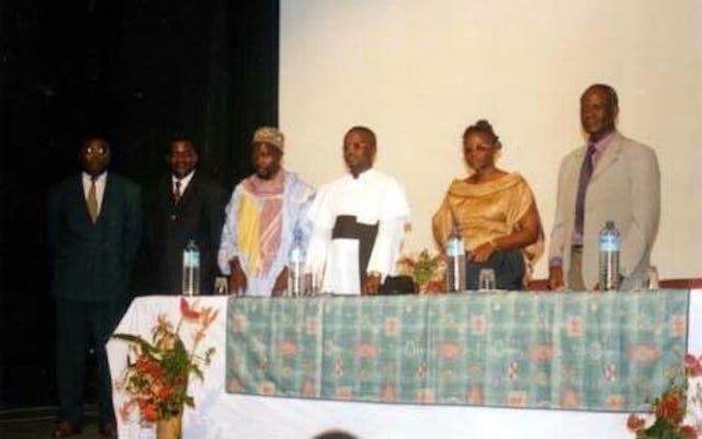 For United Nations Day on 24 October, the local Baha'i communityof Buea, Cameroon, organized an interfaith discussion on world peace.| Shown left to right are: Jules-Marcel Mondeng, permanent Secretary General of the South West Province; John Akuri, moderator of the panel; Auztaz Mohammed Aboubakar, the Muslim Imam of Buea; the Reverend Father Alosius Ituka Ndifor, secretary to the Bishop of the Catholic Diocese of Buea; Stella Siri Fuh, the Baha'i panelist; and Yuh Laban, representative of the Hindu community of Buea.