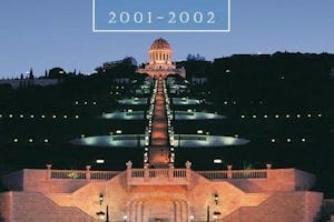 The cover of "The Baha'i World 2001-2002," featuring a photograph taken at the opening of the terraces of the Shrine of the Bab on Mt. Carmel in Haifa, Israel