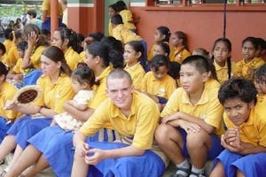 Students at the opening of the new buildings at the Ocean of Light International School reflect a diversity of backgrounds.