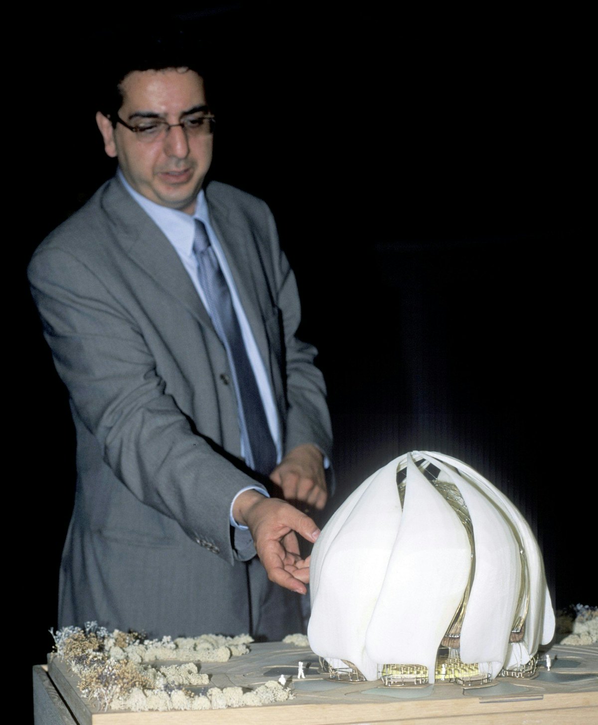 Architect of the Baha'i Temple to be built in Chile, Siamak Hariri, with a model of the building.