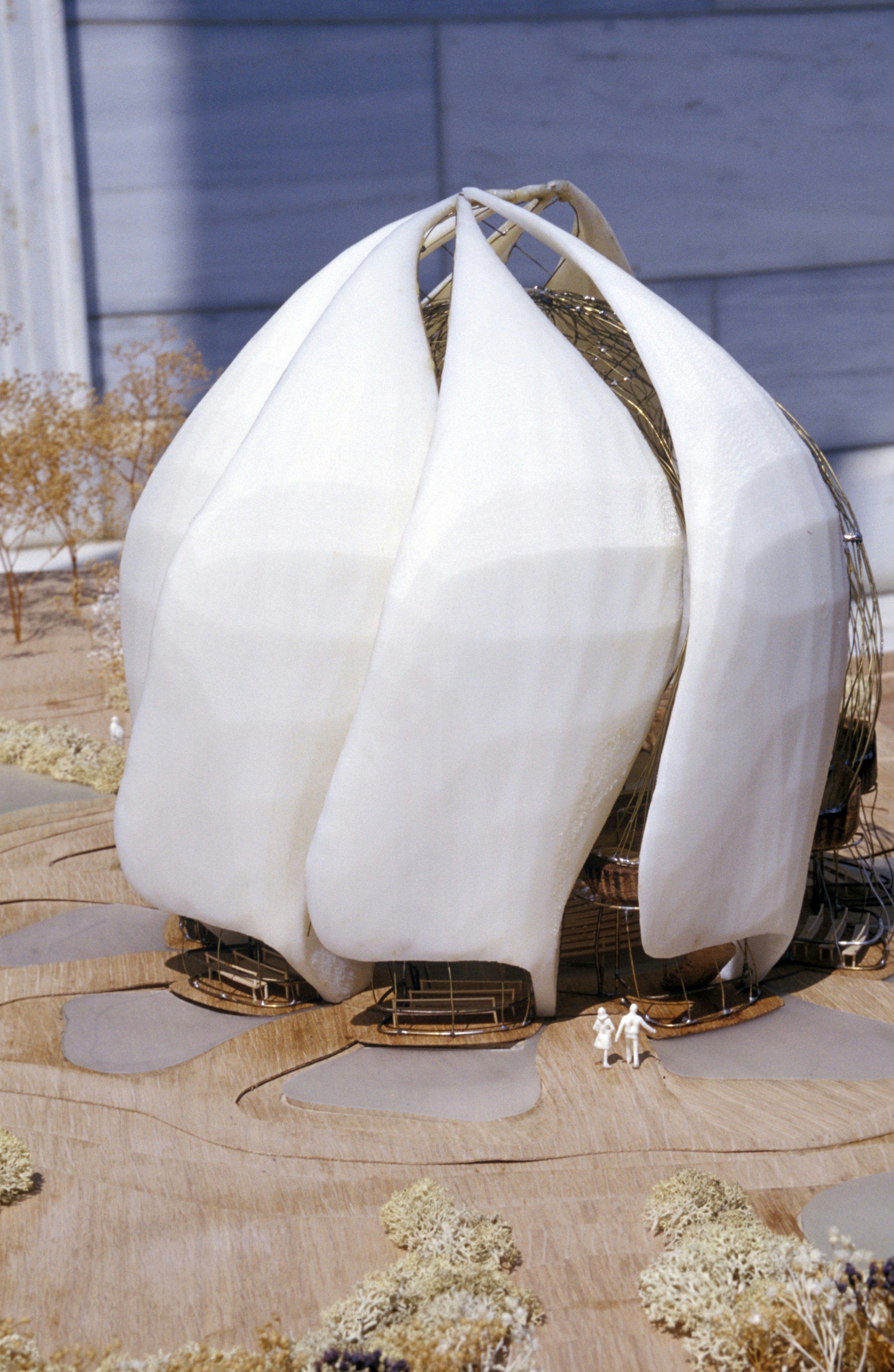 Models of people give an indication of the height of the Baha'i Temple to be built near Santiago, Chile.